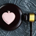 Cutout family and colourful letters regarding child-custody and family-law concep